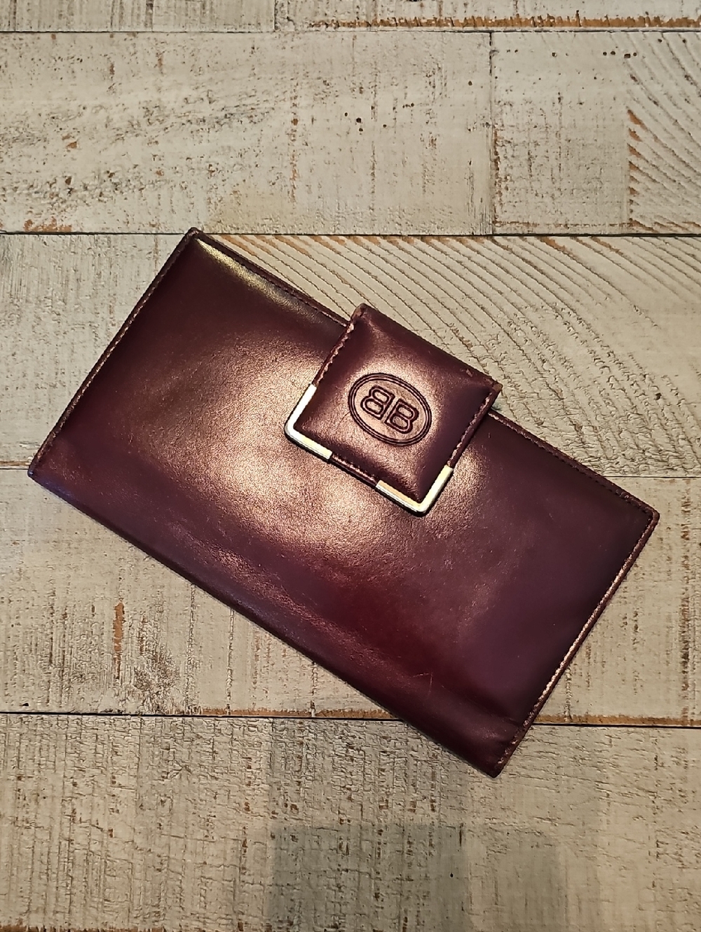 Buxton Burgundy Leather Clutch Wallet with BB Emblem